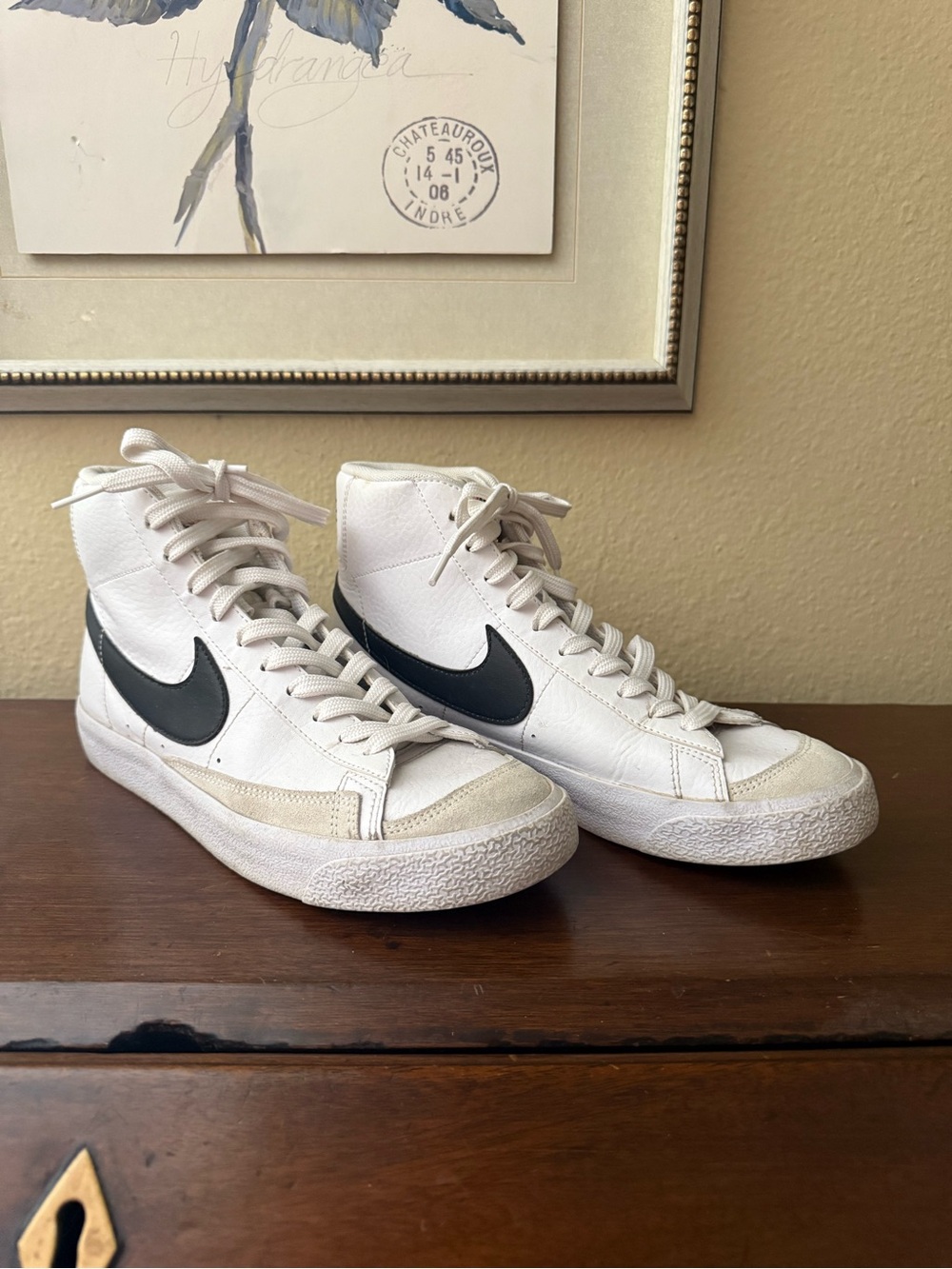 Nike White High-Top Sneakers with Black Swoosh